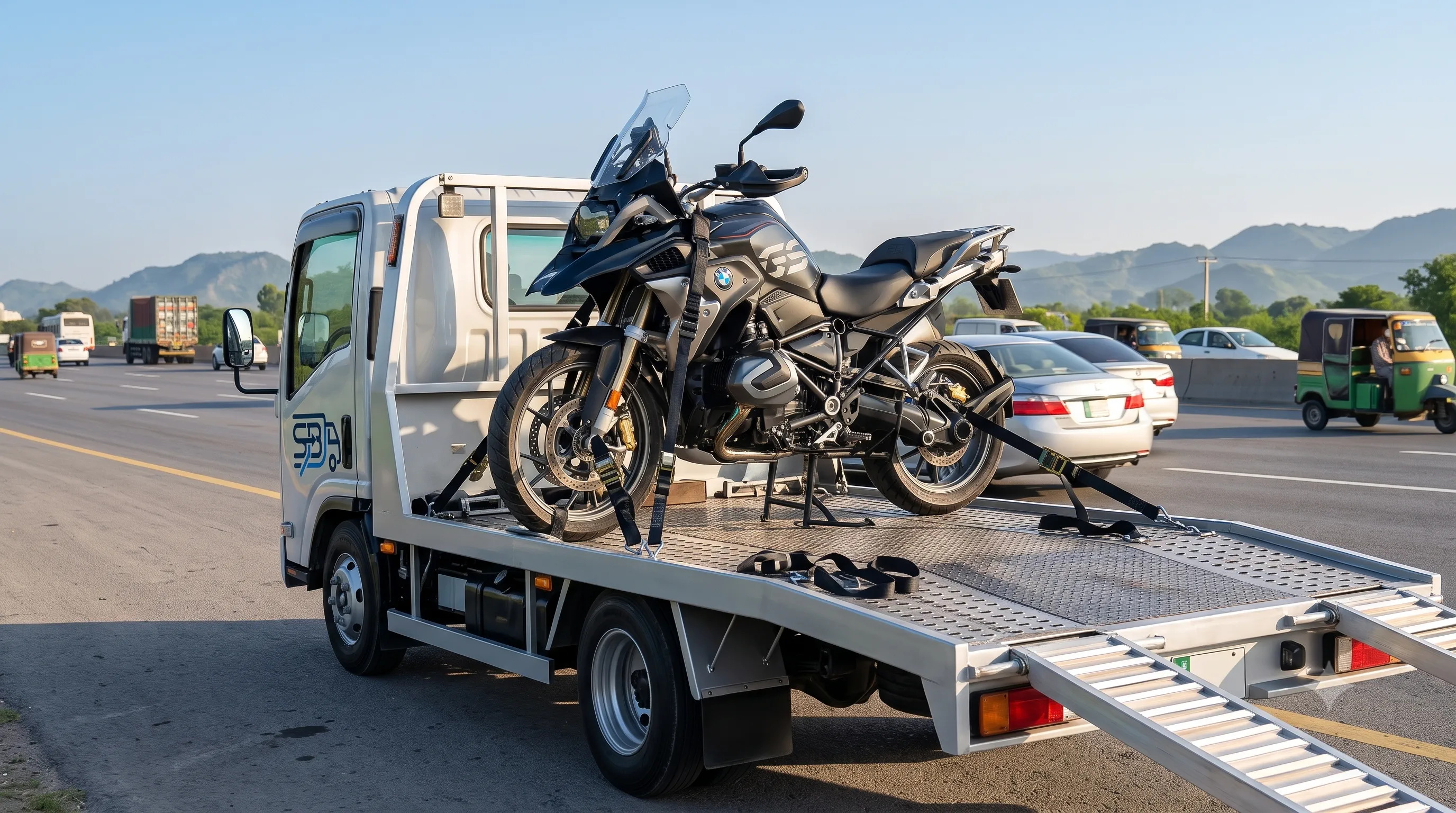 Motorcycle transport on a carrier across Pakistan